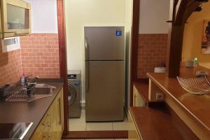 Cucina o angolo cottura di Le Lis Vacances et Affaire Cosy vue Mer