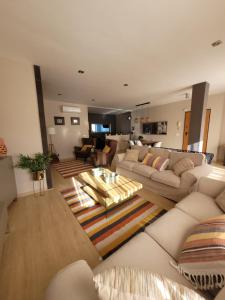 Posezení v ubytování Ático Dúplex Baladrar Gran Terraza 8Km Playa Dénia-Oliva Nova Golf -IDEAL Familias y Grupos