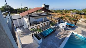 an aerial view of a house with a swimming pool at SUITE GRANDE in Santa Marta