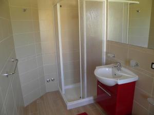 a bathroom with a shower and a sink at B&B Mare & luna in San Sostene