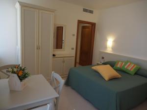 Кровать или кровати в номере Lido Resort