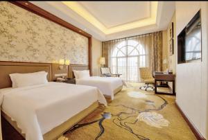 Μια τηλεόραση ή/και κέντρο ψυχαγωγίας στο Days Hotel by Wyndham Logan City Huizhou
