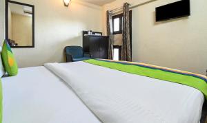 Ein Bett oder Betten in einem Zimmer der Unterkunft Treebo Siddharth