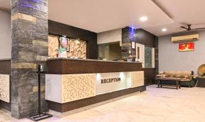 a lobby of a hotel with a reception desk at Treebo Trend Siddharth in Ajmer