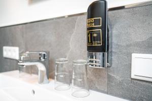 Koupelna v ubytování Berghotel & Chalets Adersberg Chiemgau Card kostenfrei
