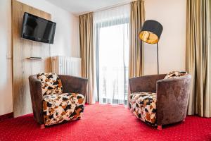 Posezení v ubytování Berghotel & Chalets Adersberg Chiemgau Card kostenfrei