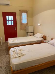 Postel nebo postele na pokoji v ubytování Pension Romantika