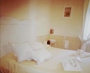 Postel nebo postele na pokoji v ubytování Bed and Breakfast Evelina