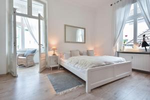 Postel nebo postele na pokoji v ubytování Schloß Hohenzollern 22 + 5 fotografií