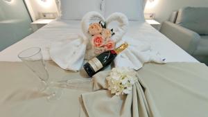A bed or beds in a room at Anastasia Boutique Suites -Adults only & kids 12 plus