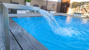 The swimming pool at or close to Anastasia Boutique Suites -Adults only & kids 12 plus