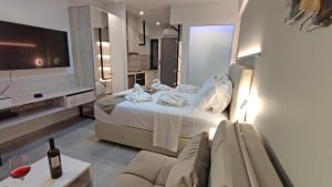 A bed or beds in a room at Anastasia Boutique Suites -Adults only & kids 12 plus