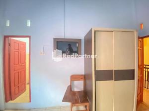TV/Unterhaltungsangebot in der Unterkunft Homestay Tirtasari Pinrang City Center Mitra RedDoorz