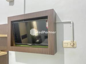 TV/Unterhaltungsangebot in der Unterkunft Homestay Tirtasari Pinrang City Center Mitra RedDoorz