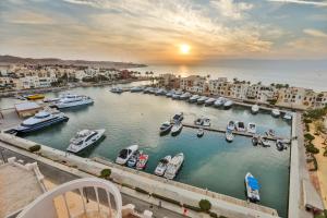 a view of a harbor with boats in the water at Tala Bay Residence in Aqaba