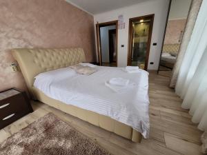 Ένα ή περισσότερα κρεβάτια σε δωμάτιο στο Villa Mery