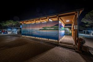 Bazén v ubytování Camping Internazionale Etruria nebo v jeho okolí