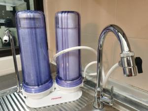 a purple blender sitting on top of a sink at 3min MITEC KL Publika Ocean Classic Condo 2308 in Kuala Lumpur