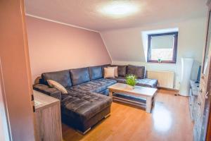 Posezení v ubytování Rheinterrasse Wohnung 2