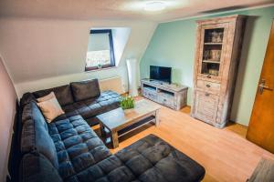 Posezení v ubytování Rheinterrasse Wohnung 2