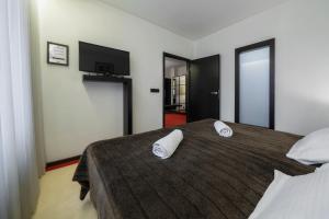 Łóżko lub łóżka w pokoju w obiekcie Hotel Astory Plzeň