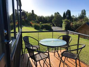 Ein Balkon oder eine Terrasse in der Unterkunft Cabañas Monte Verde