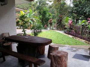 En have udenfor Green Season Cottage + 3 billeder