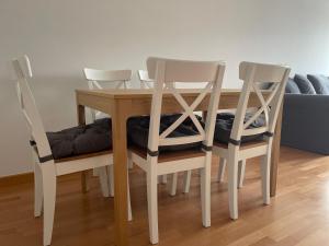 A seating area at OKTHEWAY Castelao Street
