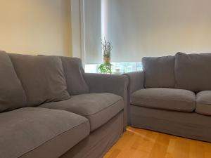 A seating area at OKTHEWAY Castelao Street