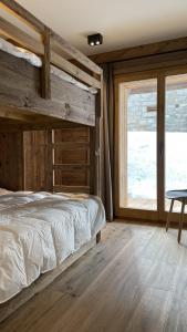 Postel nebo postele na pokoji v ubytování Polaris 1 001 - LUXE & SKI LIFT apartment 6 pers