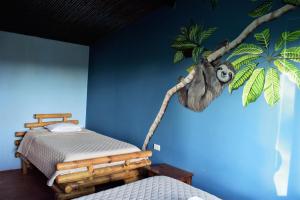 Cama o camas de una habitación en Casitas Eco Bambú