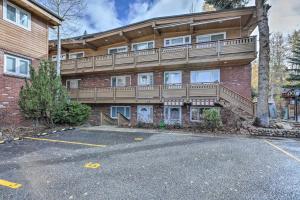 an apartment building with a balcony on top of it at Aspen Condo with Mountain Views and Ski Access! in Aspen