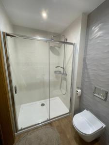 Koupelna v ubytování Apartament Kołobrzeg Kasprowicza