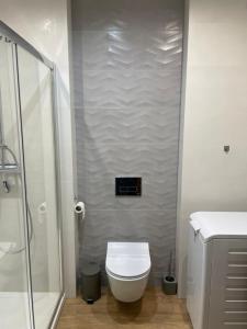 Koupelna v ubytování Apartament Kołobrzeg Kasprowicza