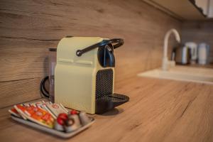 A kitchen or kitchenette at University city life Bestern