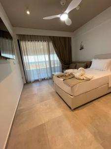 A bed or beds in a room at Anastasia Boutique Suites -Adults only & kids 12 plus