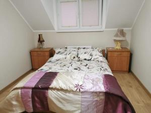 Łóżko lub łóżka w pokoju w obiekcie Apartamenty u Wieśka