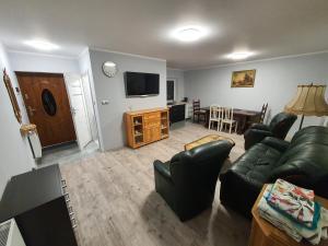 Telewizja i/lub zestaw kina domowego w obiekcie Apartamenty u Wieśka