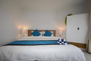Postel nebo postele na pokoji v ubytování Arena Condos Aruba - few steps from Eagle Beach! + 37 fotografií