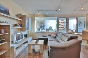 TV a/nebo společenská místnost v ubytování Terassenhügel Terrassenhügel Appartement 4