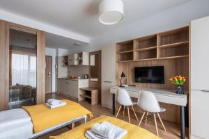 Posteľ alebo postele v izbe v ubytovaní Aparthotel City Break Wolska