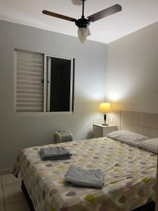 Uma cama ou camas num quarto em Plaza Norte Residence