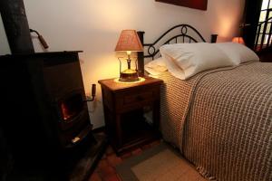 Un pat sau paturi într-o cameră la Hacienda Hato Verde