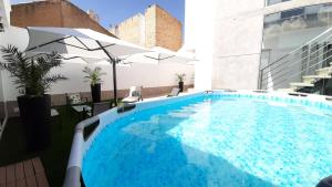 a large swimming pool on top of a building at Home VIP - Vivienda de Lujo con todo detalle in Casas Ibáñez