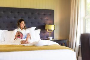 Voodi või voodid majutusasutuse Millbrook Resort toas