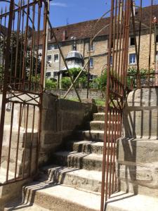 a set of stairs in front of a building at Les Tiercelines in Dole