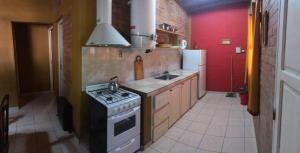Una cocina o kitchenette en Cabañas Don Victor