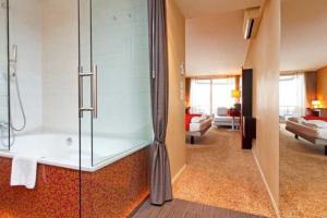Krevet ili kreveti u jedinici u okviru objekta Post Hotel Weggis