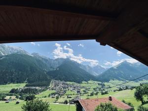 a view of a mountain valley from a house at Apartments Riese in Neustift im Stubaital