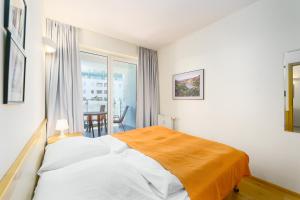 Posteľ alebo postele v izbe v ubytovaní APT Nadmorskie - Portowe